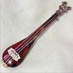 VINTAGE AMBER AND STERLING MANDOLIN PIN